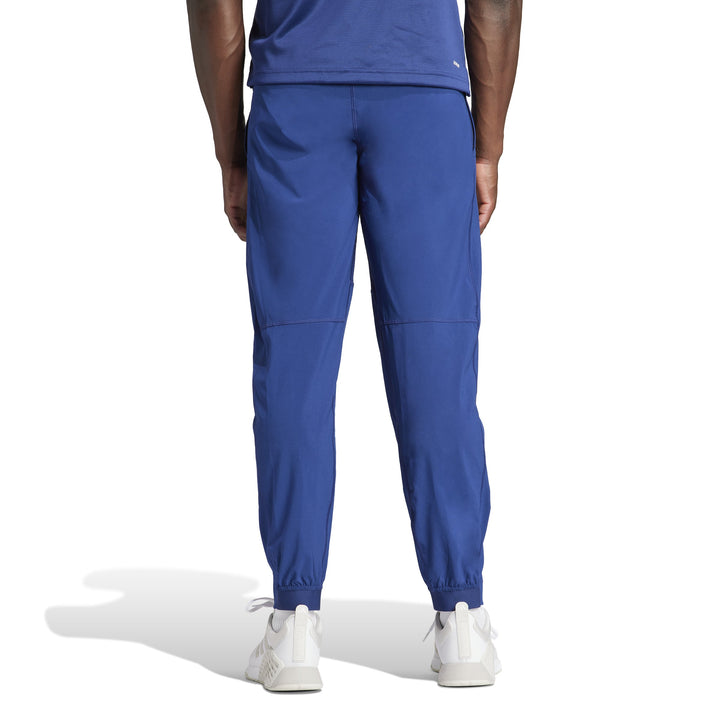 IU4606 | ADIDAS TR-ES WOVEN PT | BLUE Training PANTS