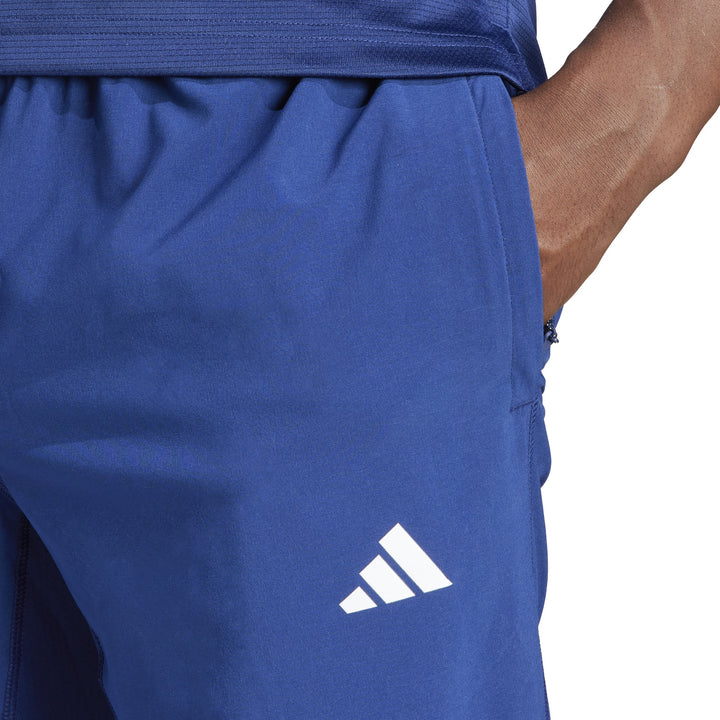 IU4606 | ADIDAS TR-ES WOVEN PT | BLUE Training PANTS