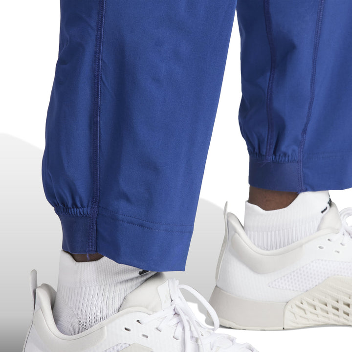 IU4606 | ADIDAS TR-ES WOVEN PT | BLUE Training PANTS